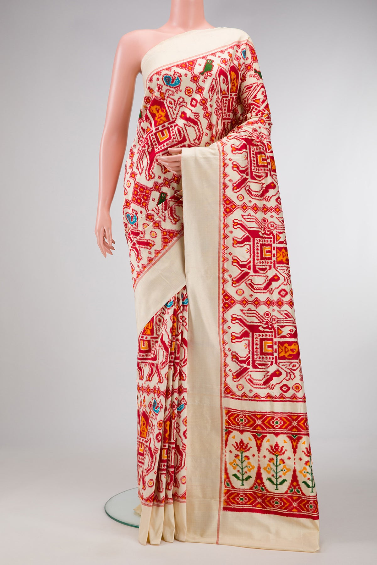 Sandal Dual Tone Double Ikat Saree with Ikat Print on the body and Plain Border.  displayed on a mannequin
