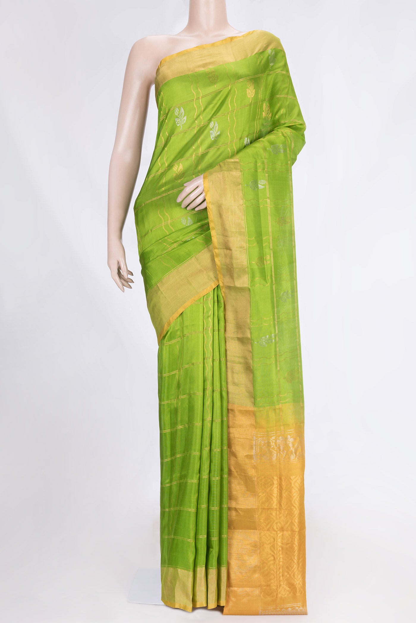 Parrot Green Dual Tone Uppada Silk Saree with Checked design on the body and Zari Border.  displayed on a mannequin