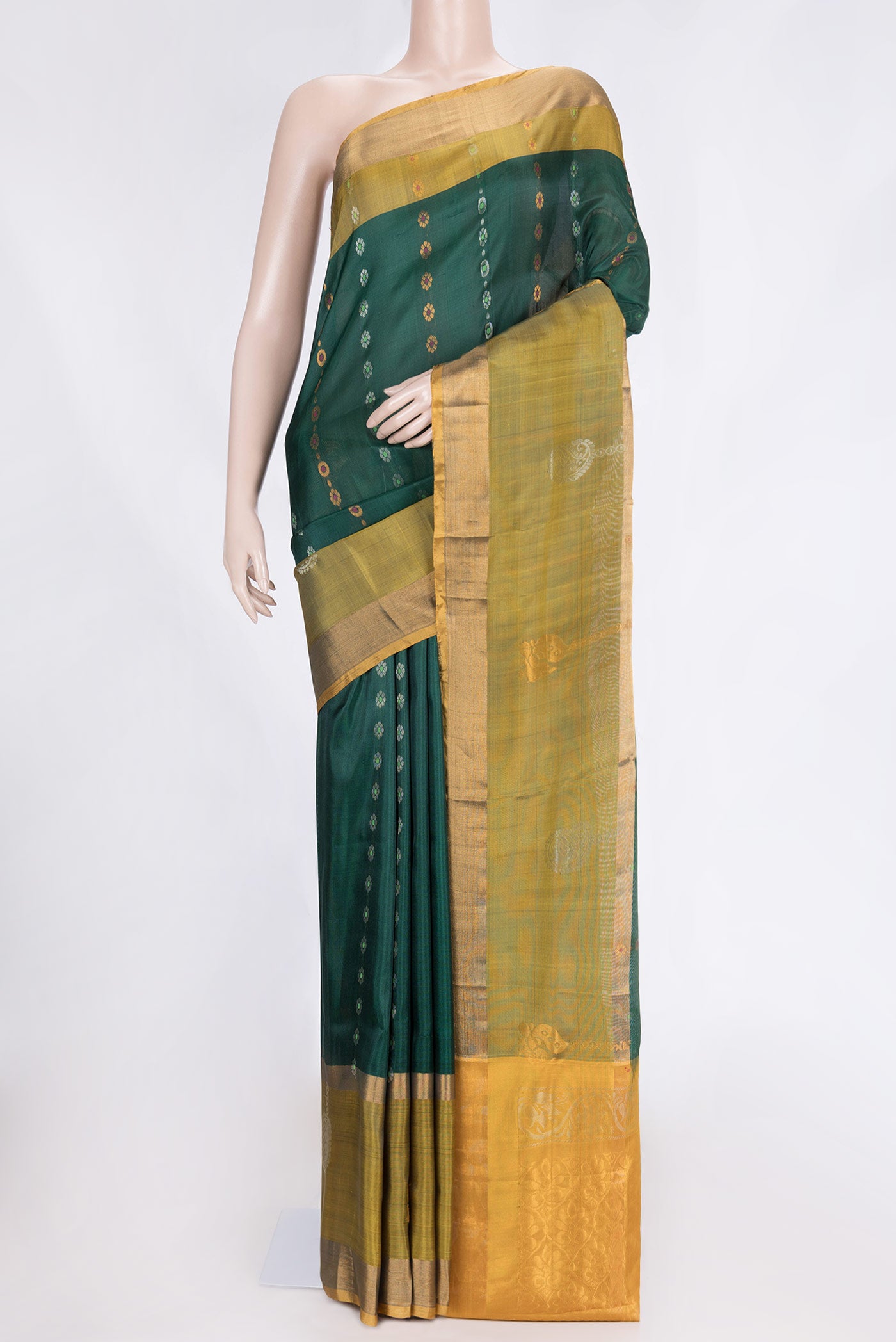 Bottle Green Dual Tone Uppada Silk Saree with Zari Butta on the body and Fancy Border.  displayed on a mannequin
