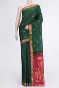 Bottle Green Dual Tone Uppada Silk Saree with Zari Butta on the body and Zari Border.  displayed on a mannequin