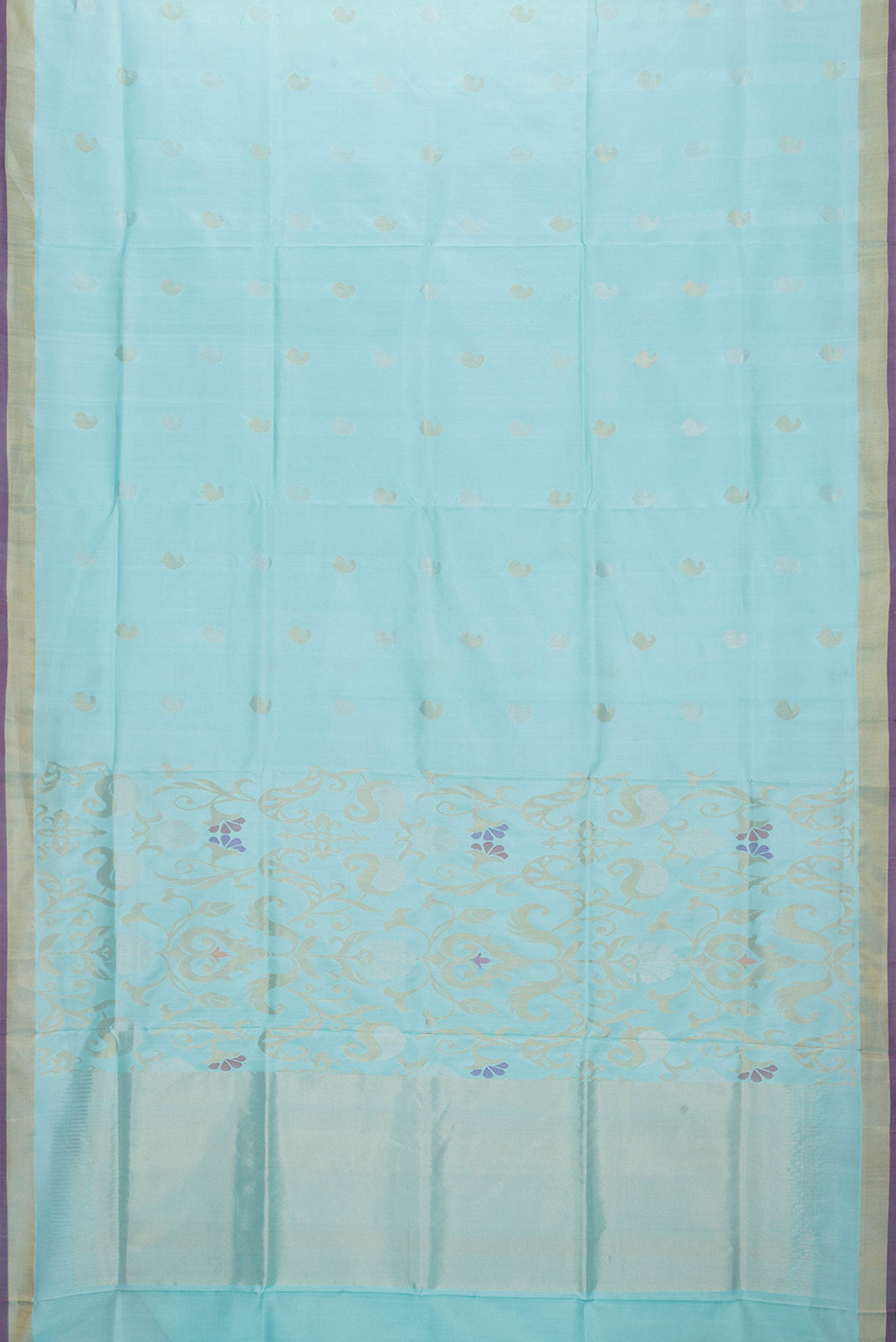 Flat view of Sky Blue Dual Tone Uppada Silk Saree with Zari Butta on the body and Zari Border. 