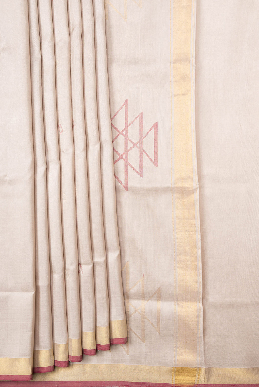 Pleats and pallu of Beige Dual Tone Uppada Silk Saree with Zari And Thread Butta on the body and Zari Border. 