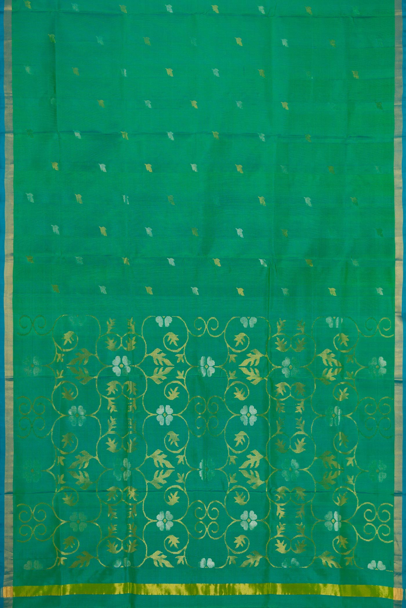 Flat view of Green Dual Tone Uppada Silk Saree with Zari Butta on the body and Zari Border. 