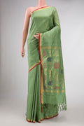 Green Dual Tone Uppada Silk Saree with Zari And Thread Butta on the body and Zari Border.  displayed on a mannequin