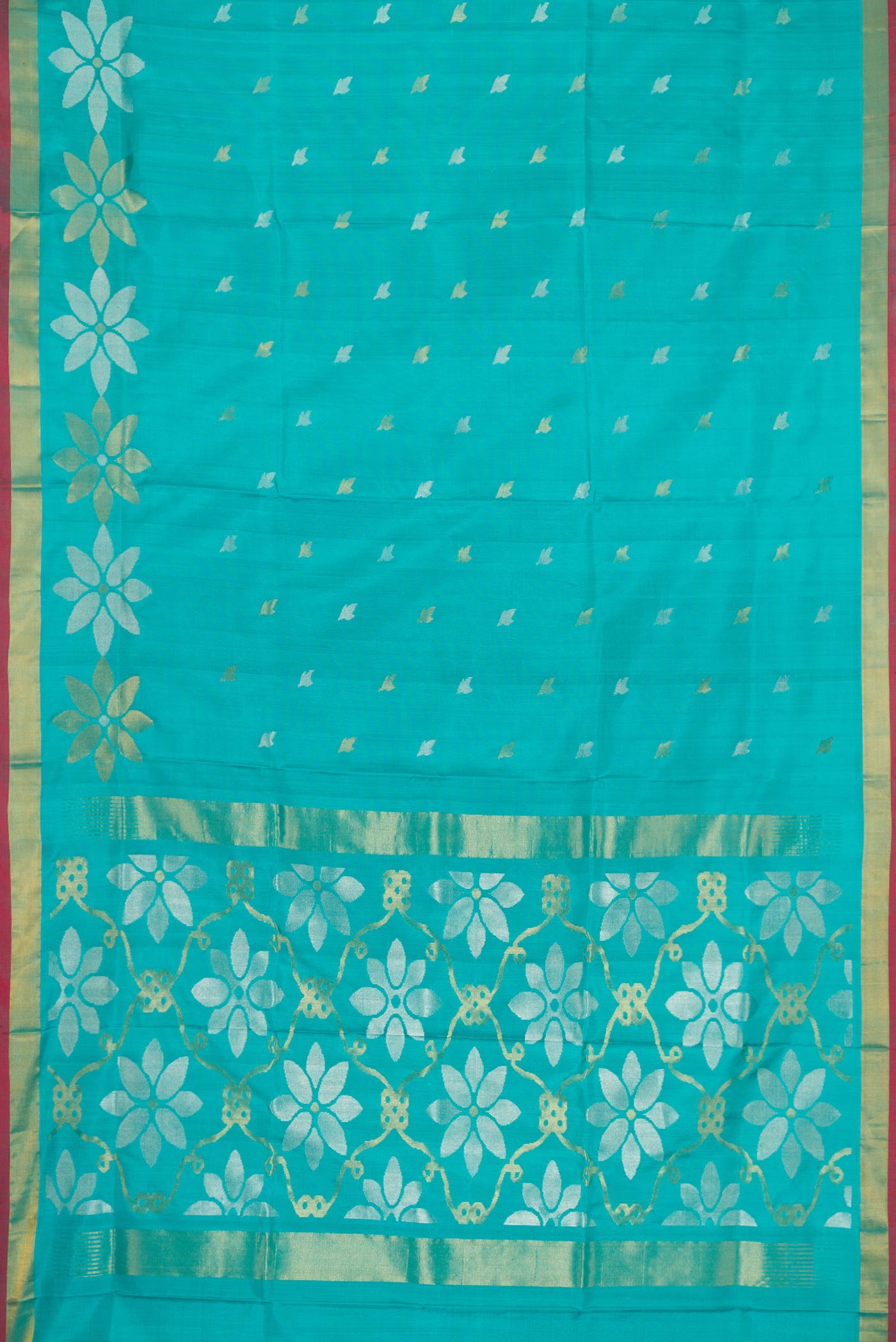 Flat view of Sky Blue Dual Tone Uppada Silk Saree with Zari Butta on the body and Zari Border. 