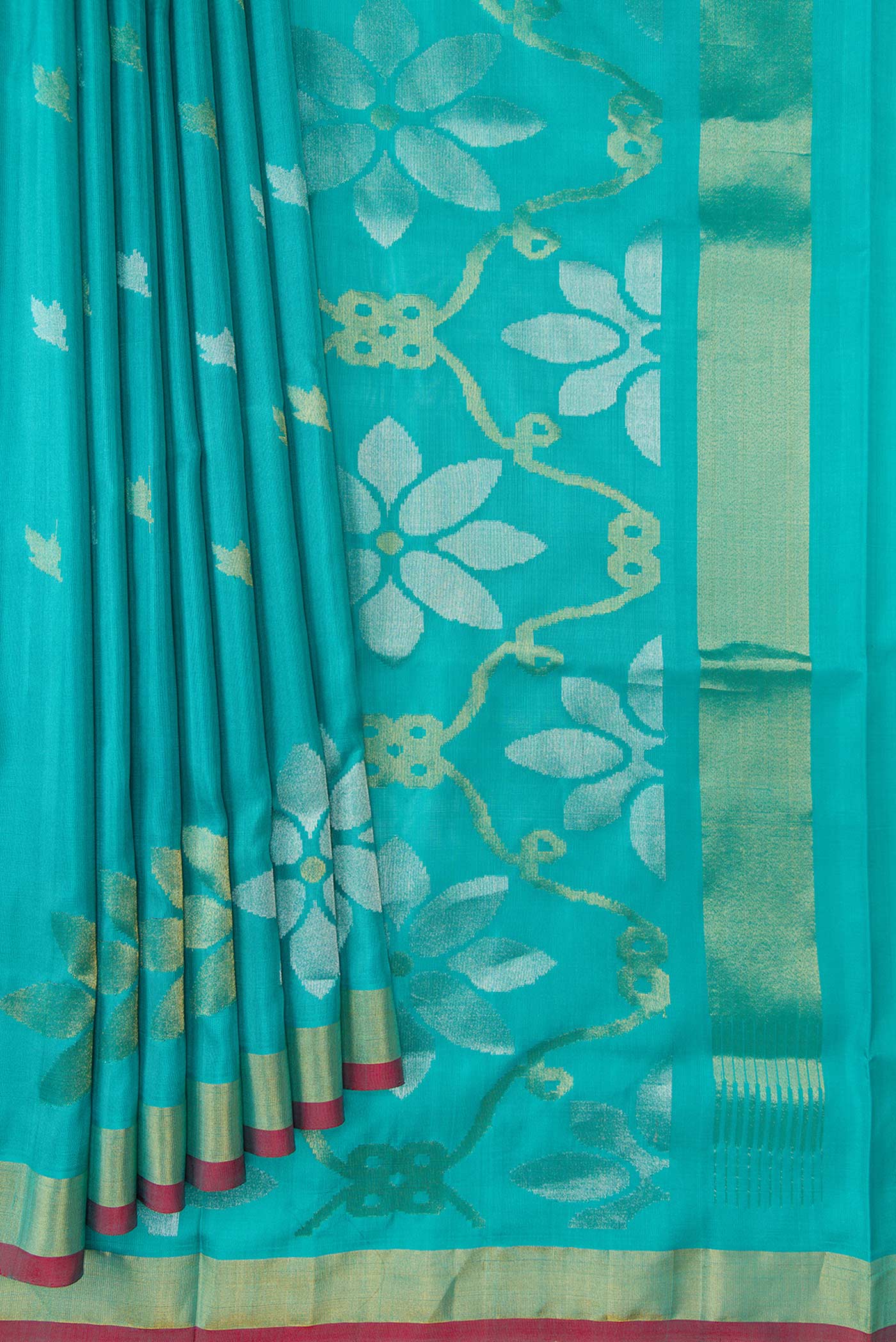 Pleats and pallu of Sky Blue Dual Tone Uppada Silk Saree with Zari Butta on the body and Zari Border. 