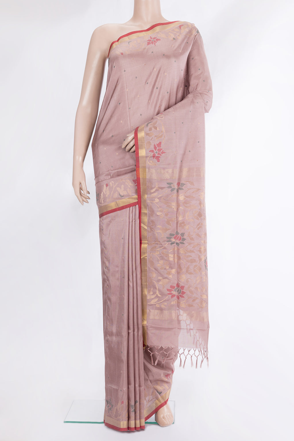 Pure Silk Rose Gold Uppada Saree with Zari And Thread Butta on the body and Zari Border.  displayed on a mannequin