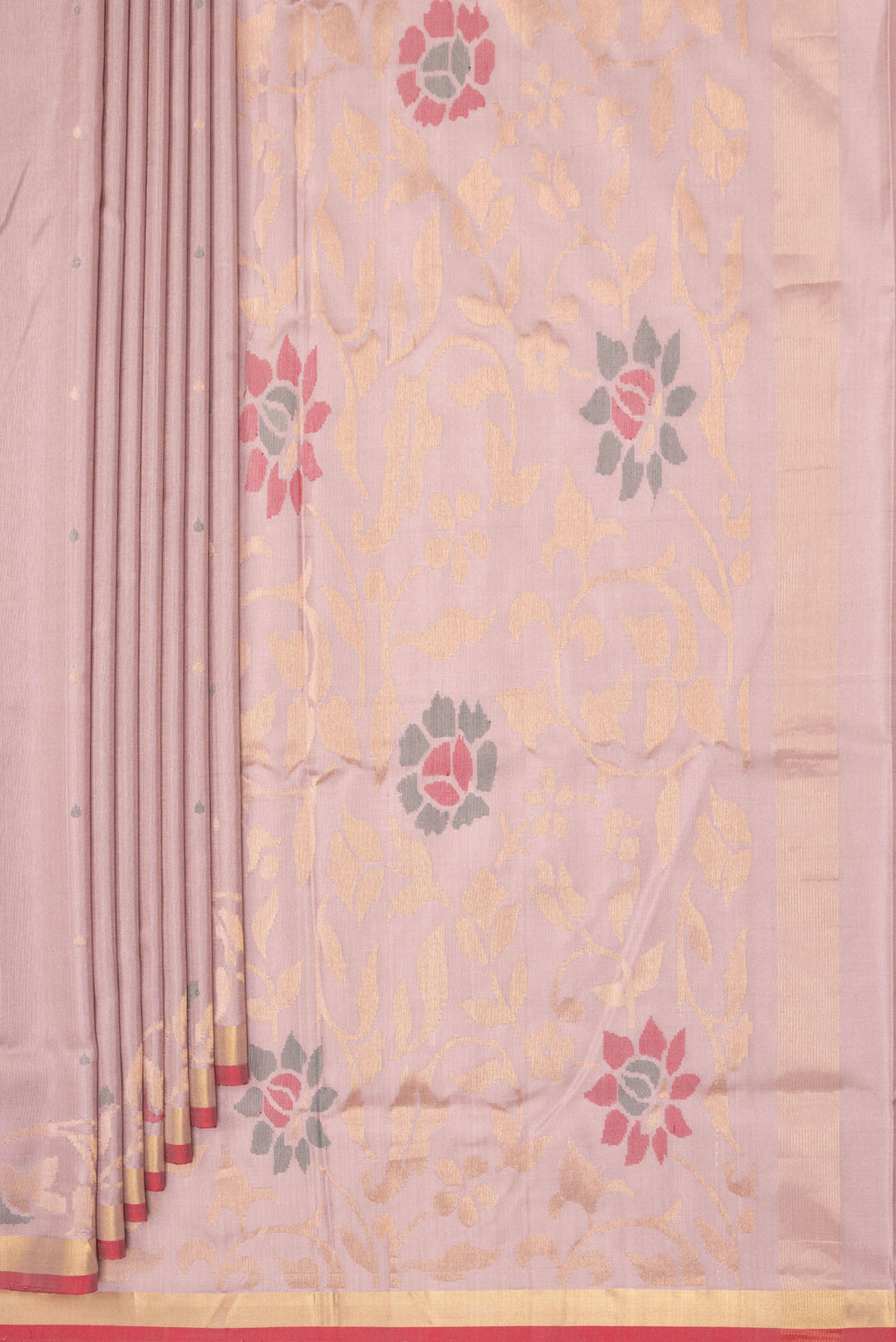 Pleats and pallu of Pure Silk Rose Gold Uppada Saree with Zari And Thread Butta on the body and Zari Border. 