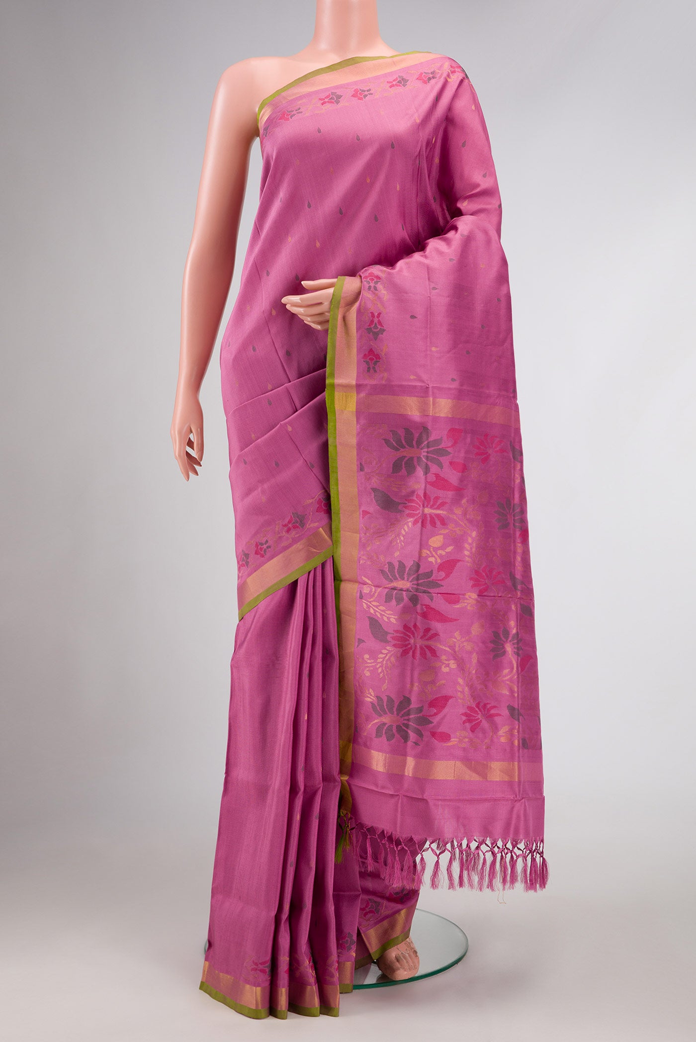 Pink Dual Tone Uppada Silk Saree with Zari And Thread Butta on the body and Zari Border.  displayed on a mannequin