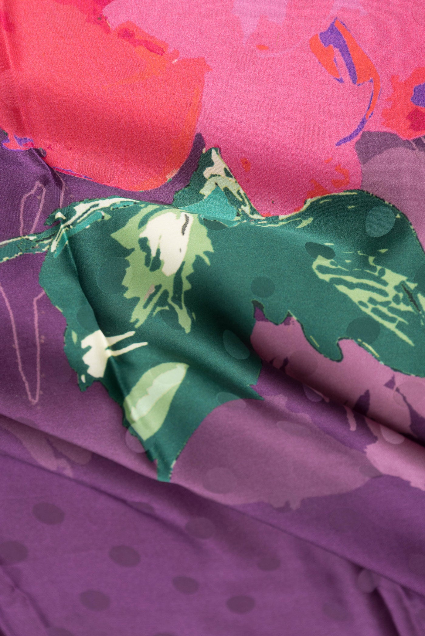 Close up of Purple Dual Tone Mysore Crepe Saree with Printed design on the body and Without Border.  displaying folds