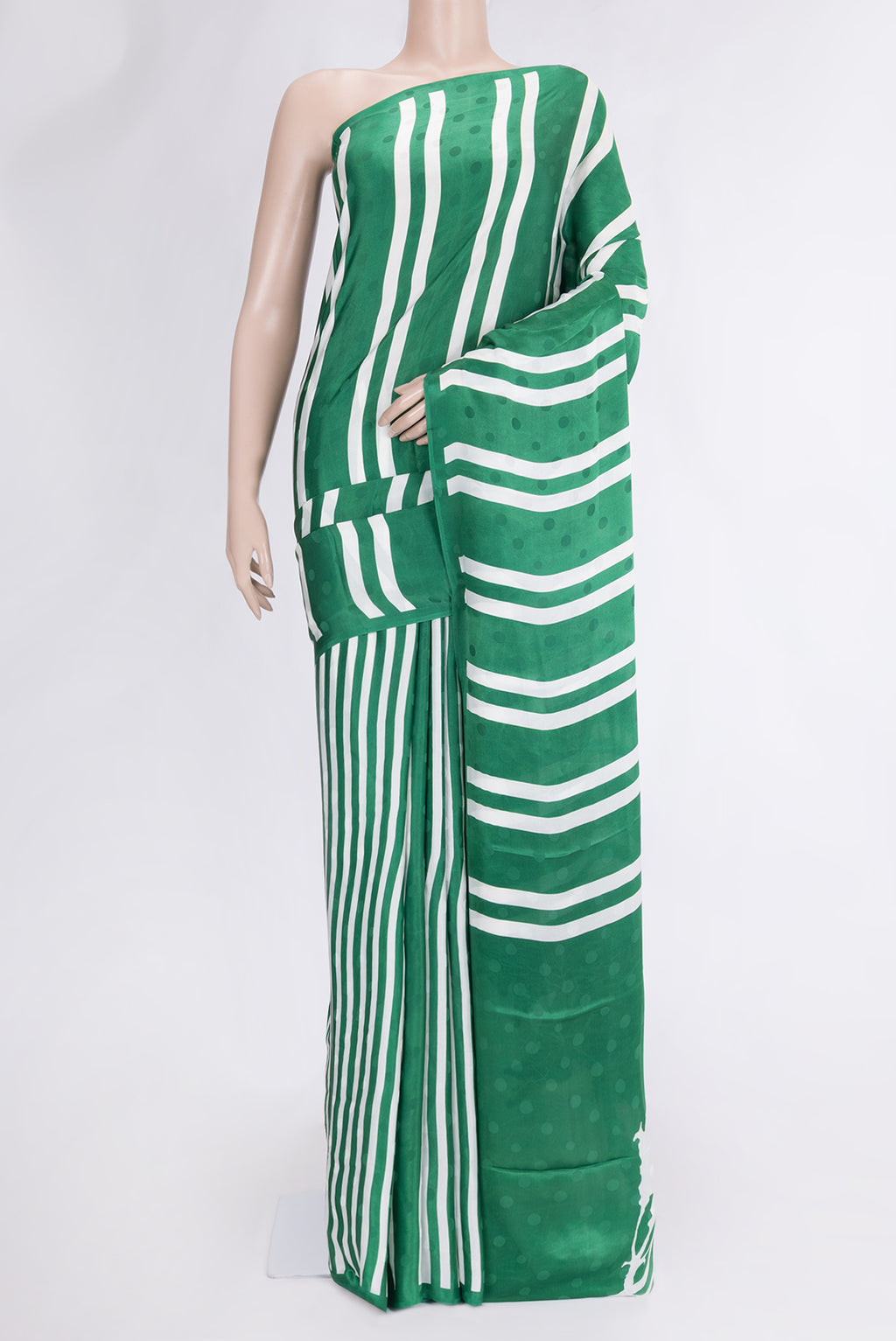Green Dual Tone Mysore Crepe Saree with Printed design on the body and Without Border.  displayed on a mannequin