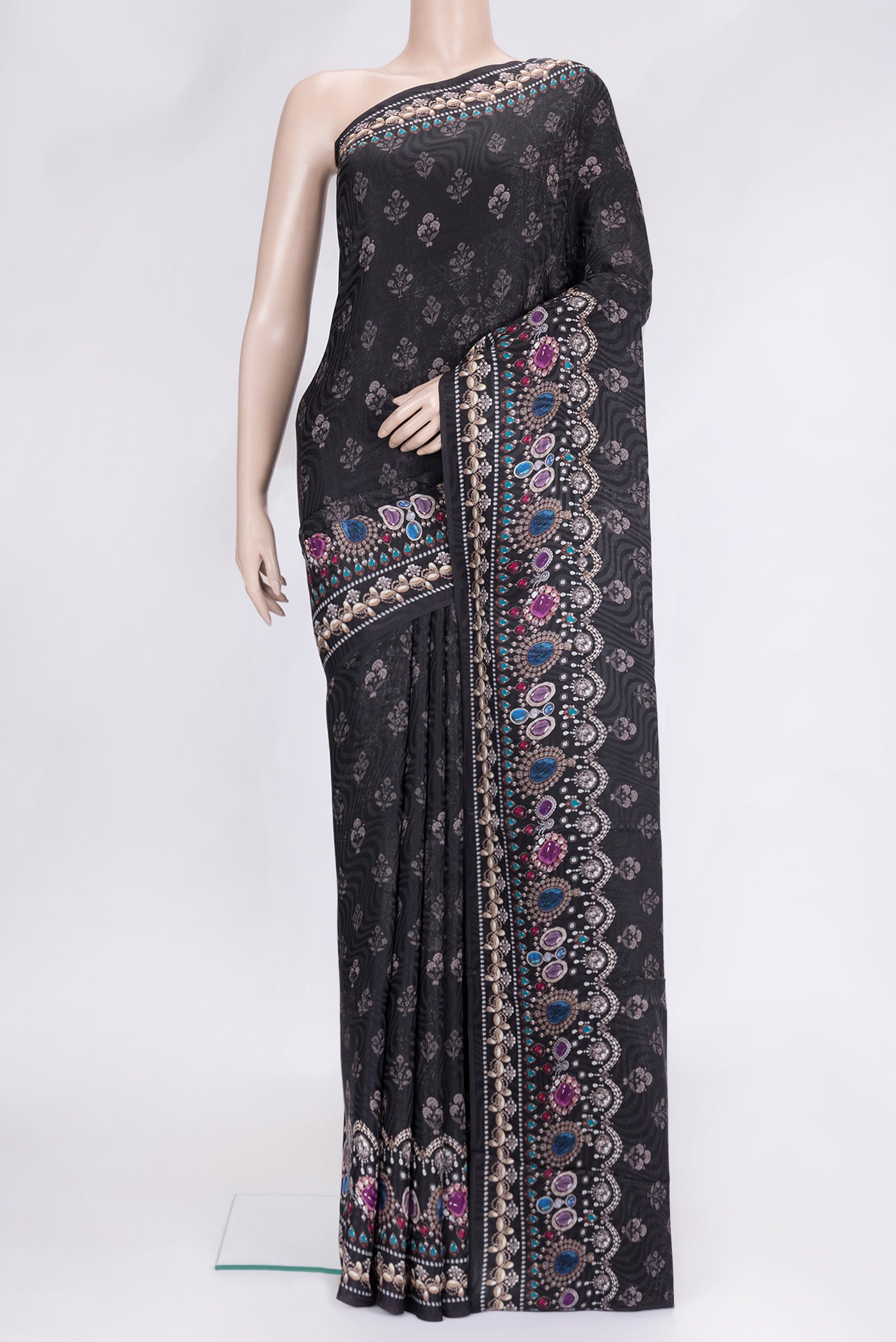 Black Dual Tone Mysore Crepe Saree with Printed design on the body and Printed Border.  displayed on a mannequin