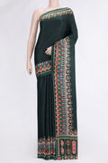Bottle Green Dual Tone Mysore Crepe Saree with Printed design on the body and Printed Border.  displayed on a mannequin