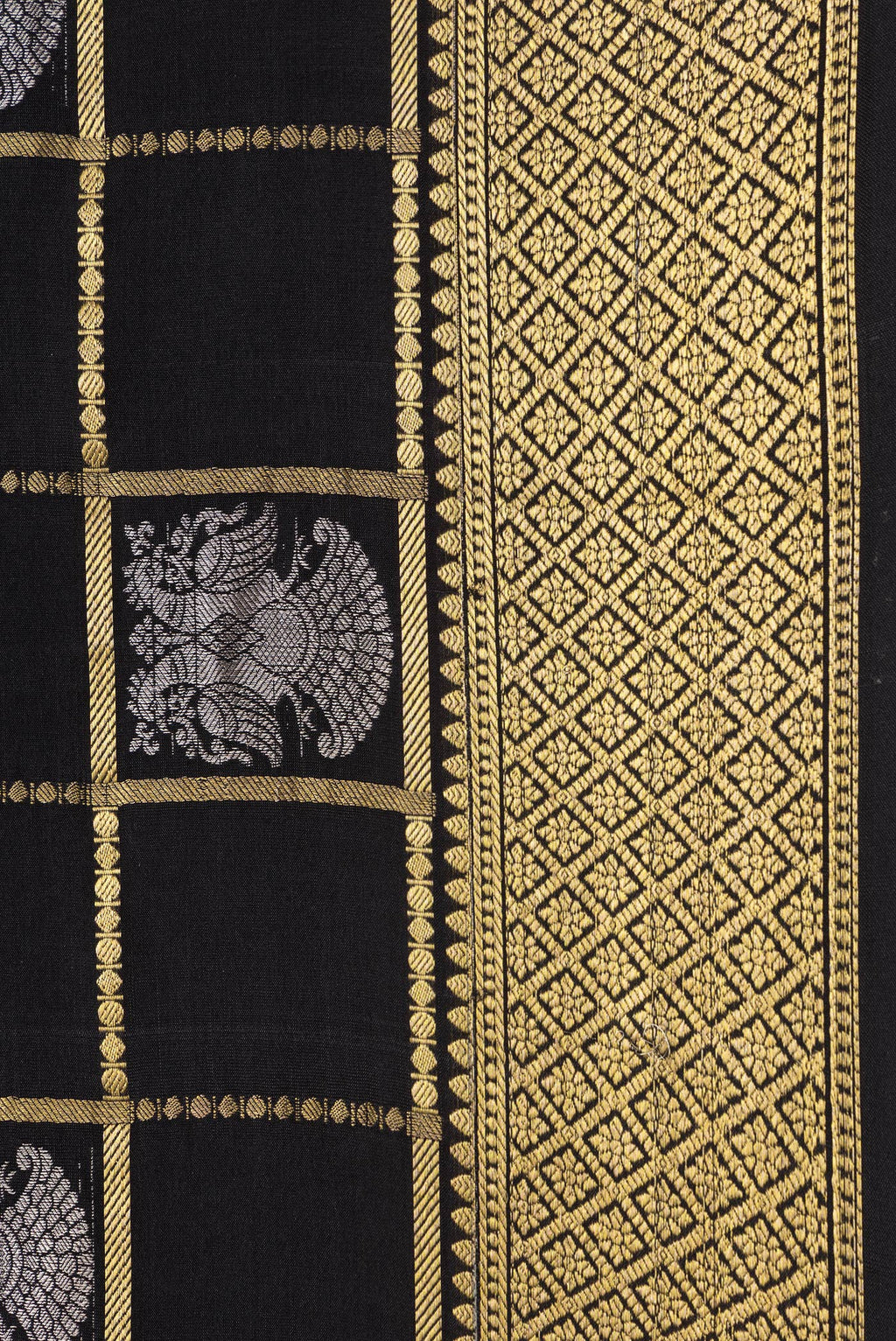 Border image of Black Dual Tone Mysore Silk Saree with Checked design on the body and Zari Border. 