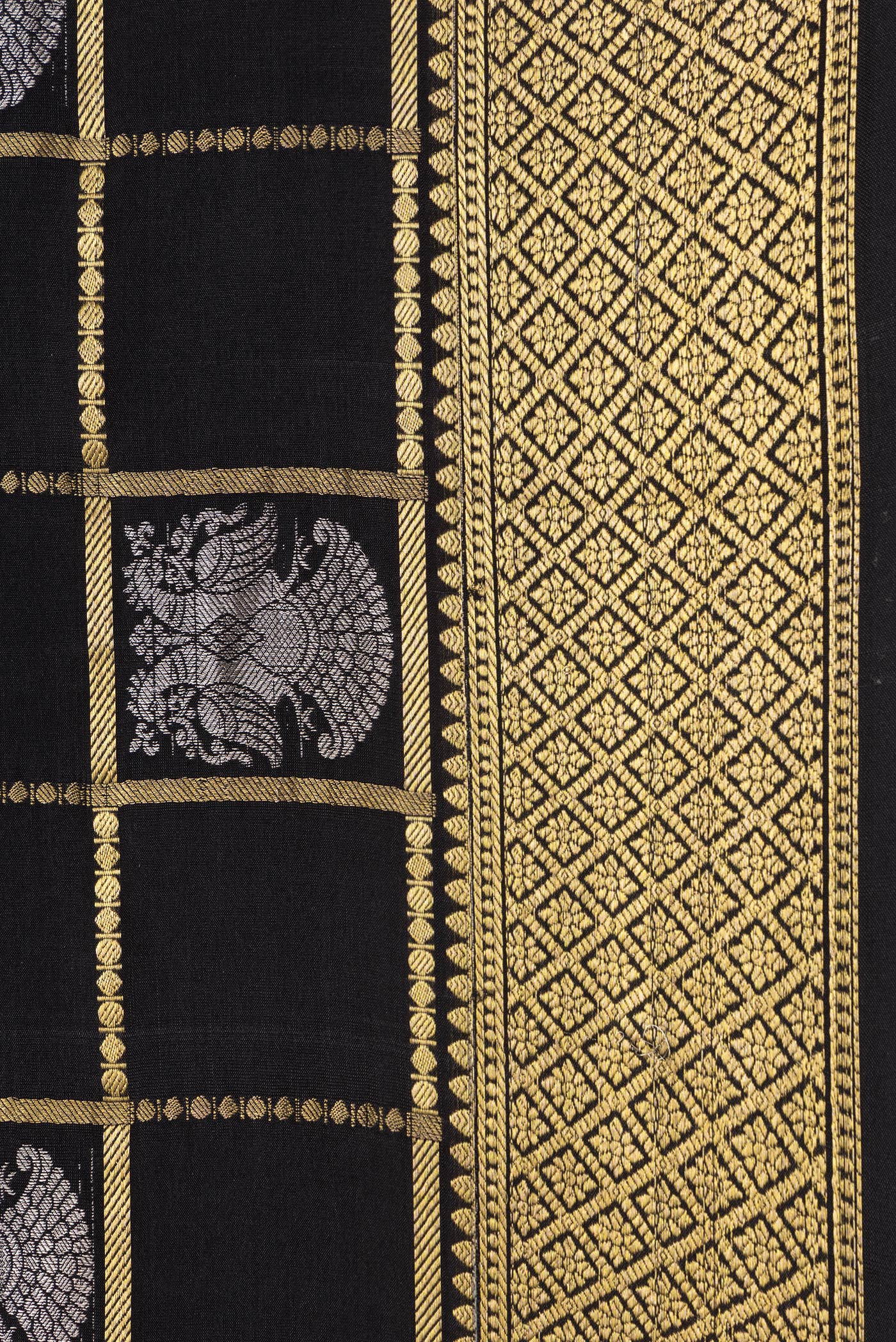 Border image of Black Dual Tone Mysore Silk Saree with Checked design on the body and Zari Border. 