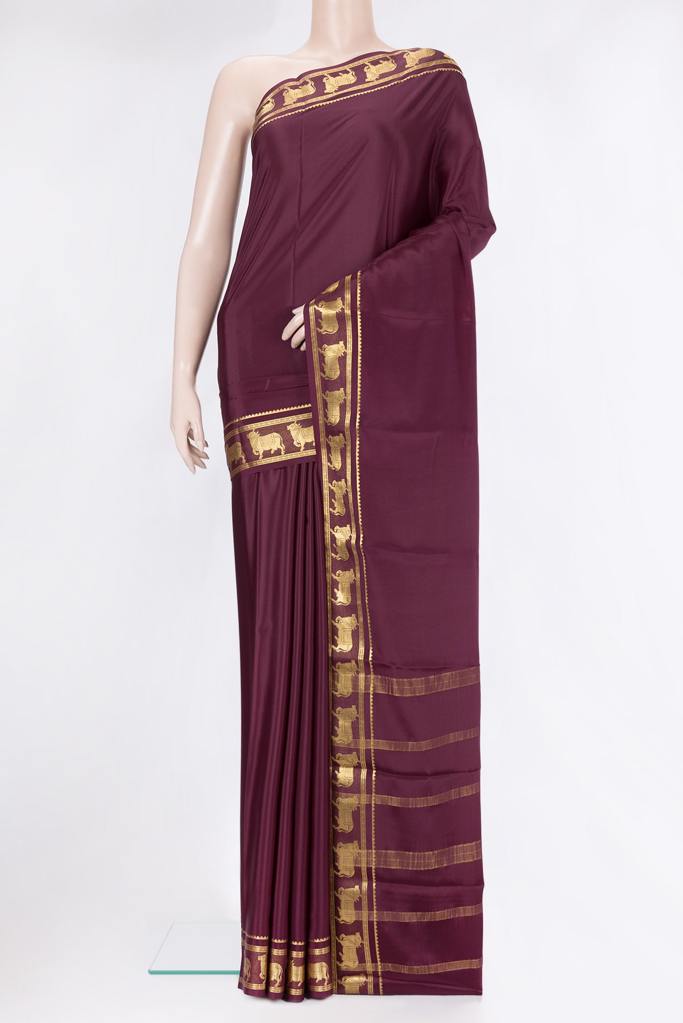 Burgundy Mysore Silk Saree with Plain Body and Fancy Border.  displayed on a mannequin