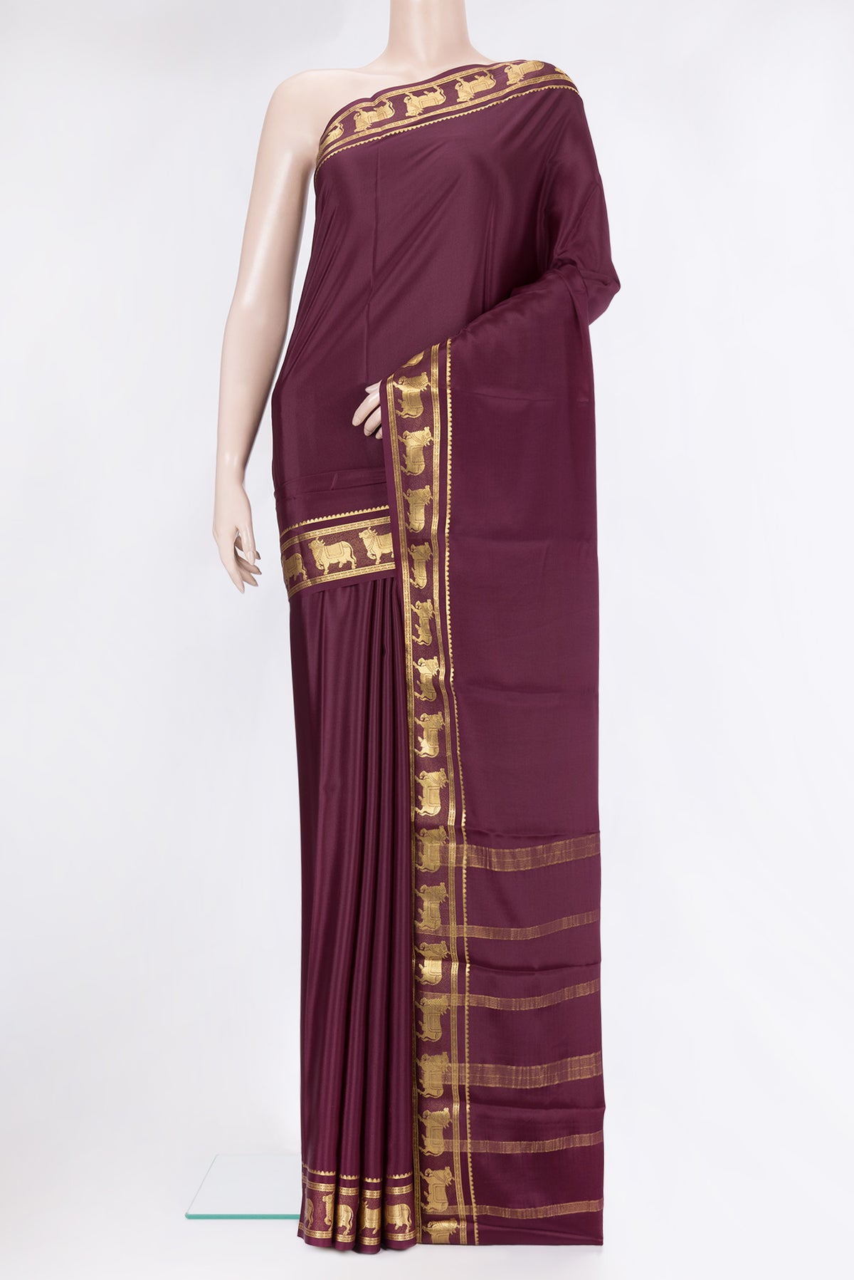 Burgundy Mysore Silk Saree with Plain Body and Fancy Border.  displayed on a mannequin