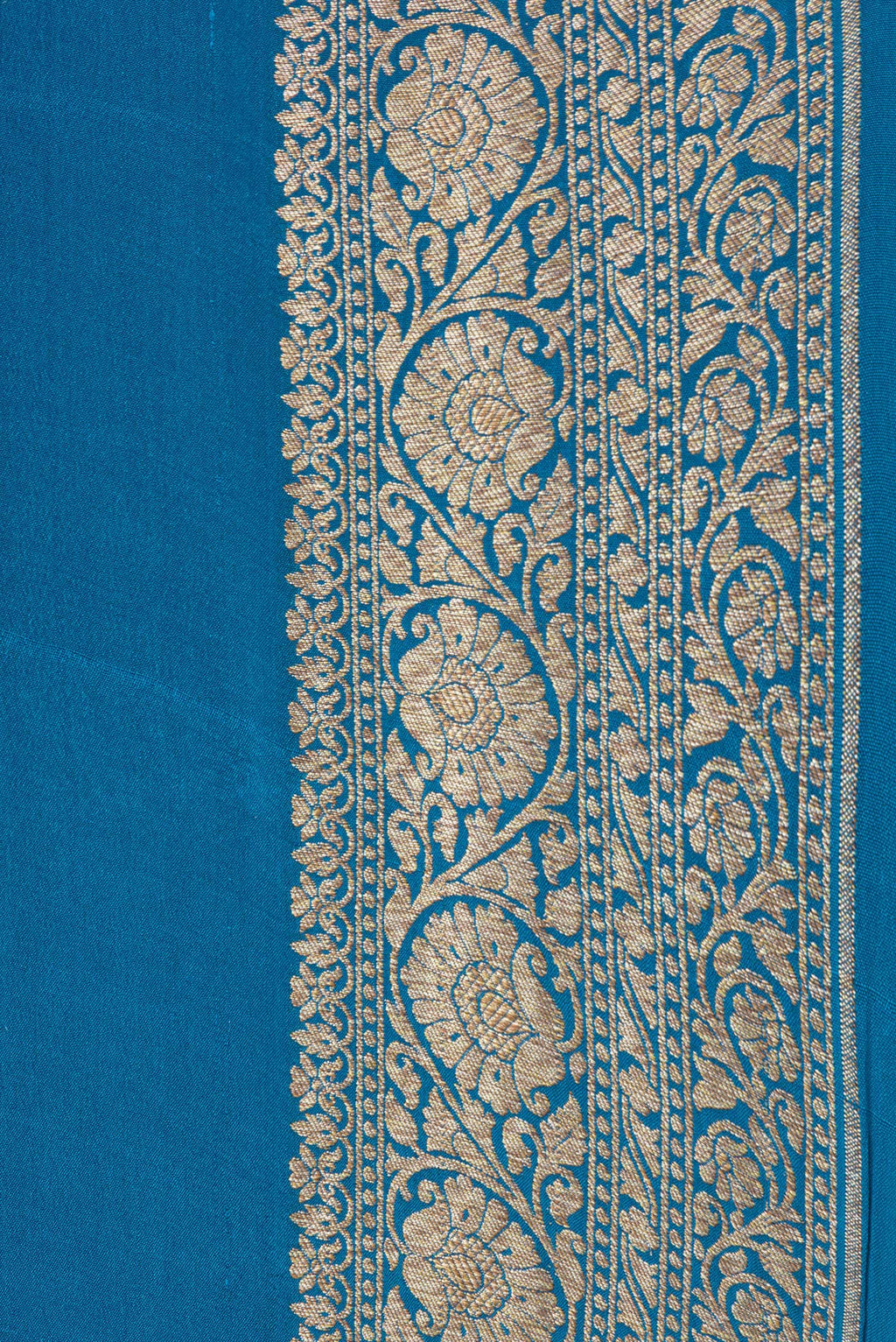 Border image of Peacock Blue Dual Tone Mysore Georgette Saree with Plain Body and Zari Border. 