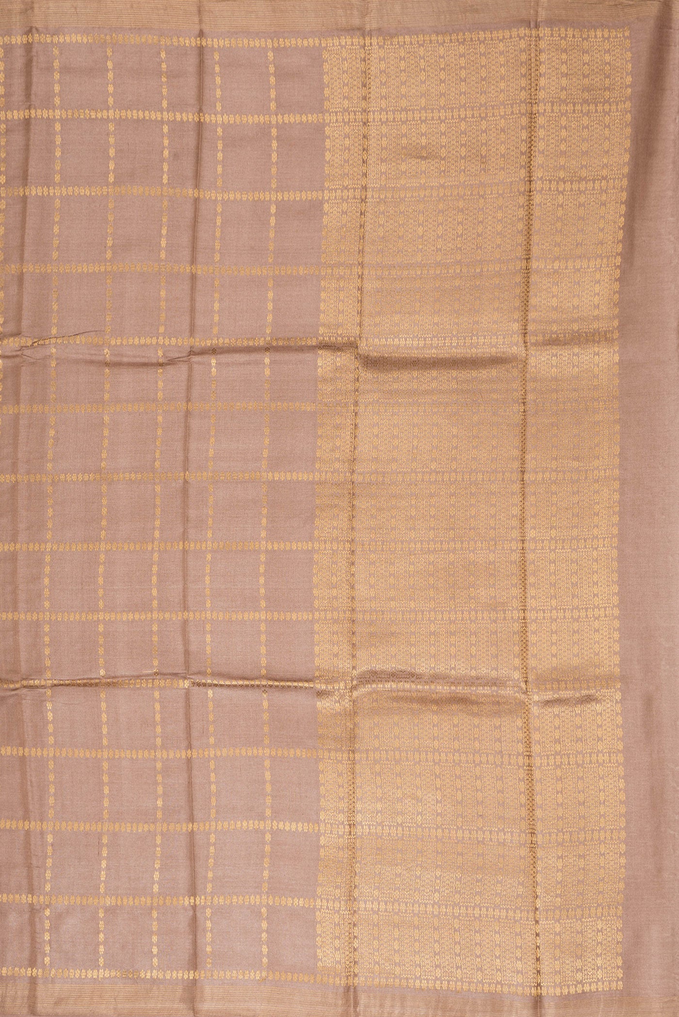 Close up image of the pallu of Brown Dual Tone Tussar Silk Saree with Checked design on the body and Zari Border. 