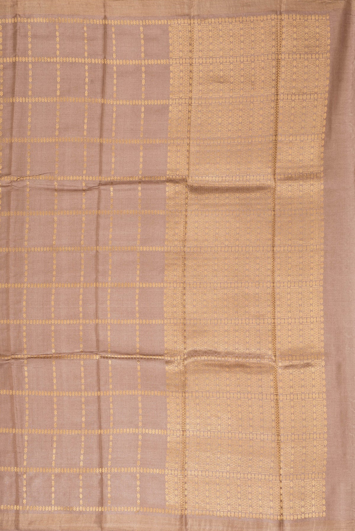 Close up image of the pallu of Brown Dual Tone Tussar Silk Saree with Checked design on the body and Zari Border. 