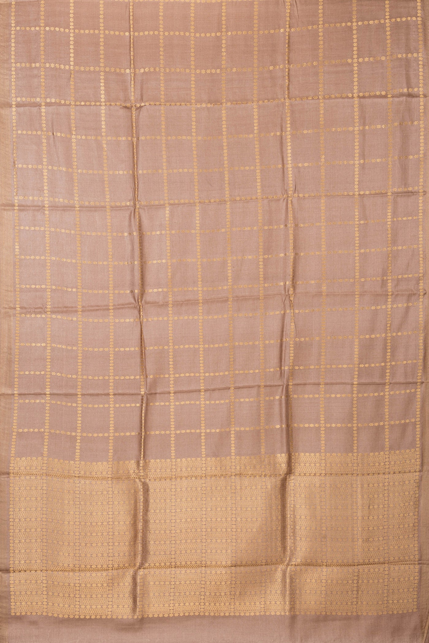 Flat view of Brown Dual Tone Tussar Silk Saree with Checked design on the body and Zari Border. 