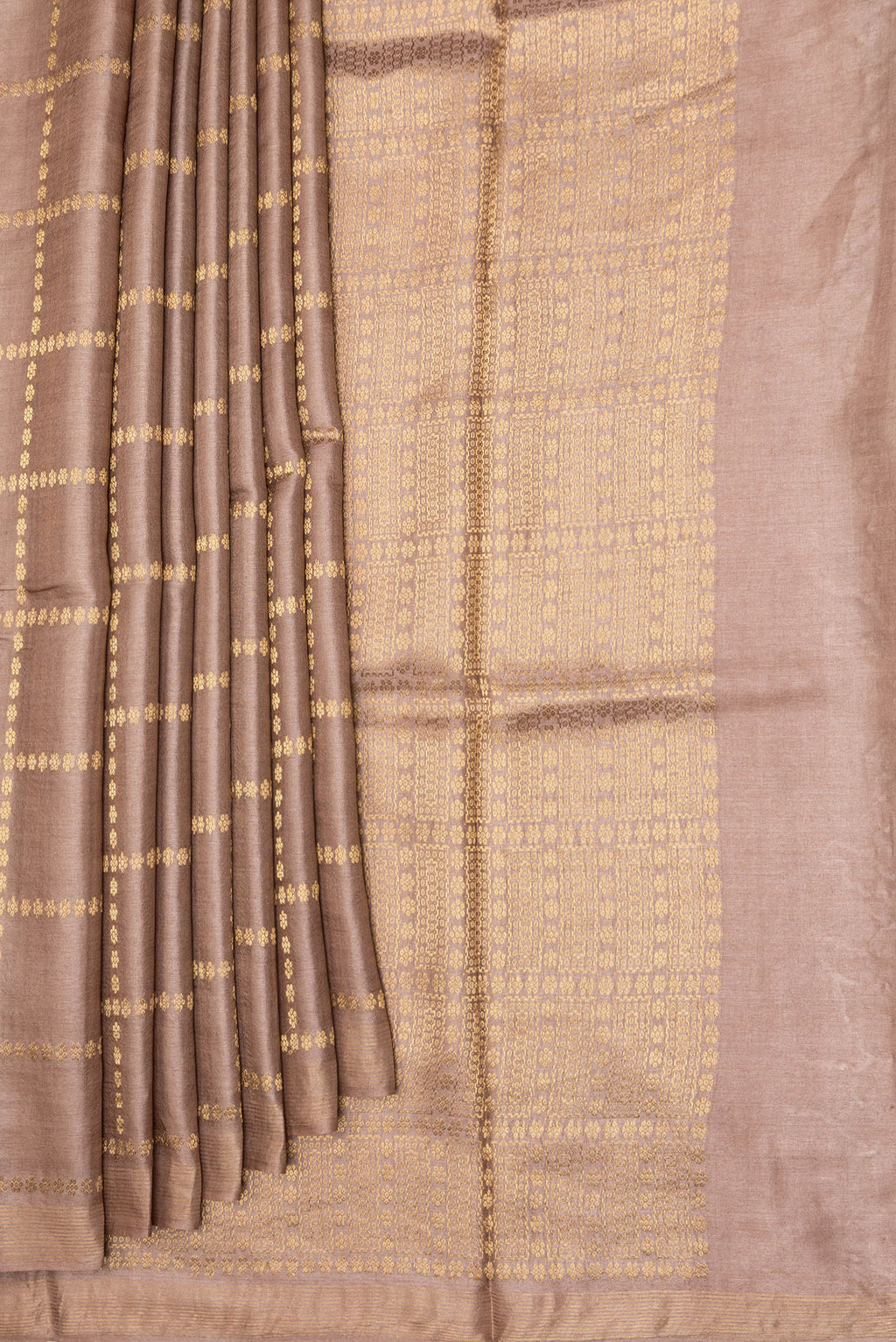 Pleats and pallu of Brown Dual Tone Tussar Silk Saree with Checked design on the body and Zari Border. 