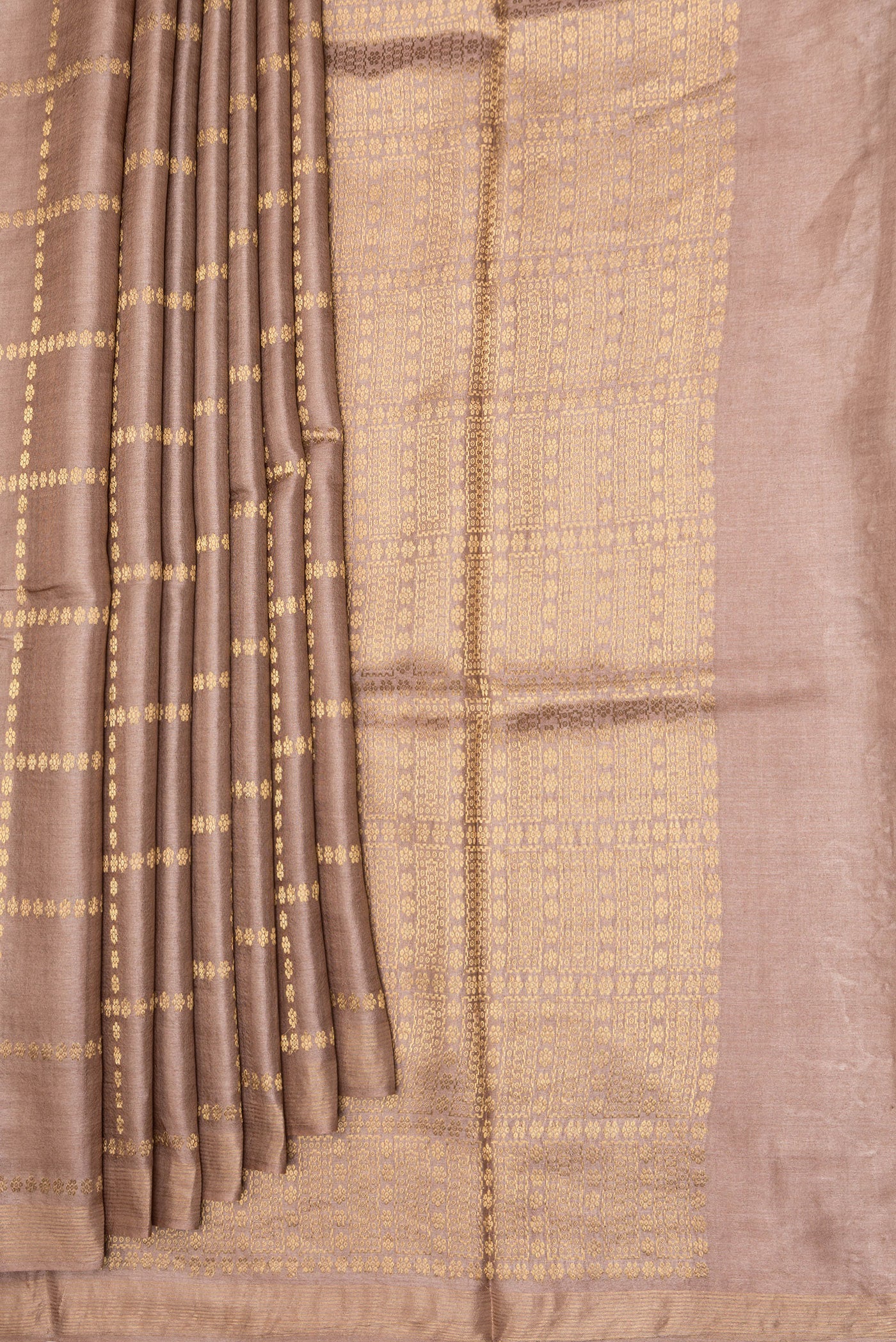 Pleats and pallu of Brown Dual Tone Tussar Silk Saree with Checked design on the body and Zari Border. 