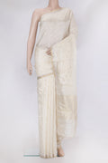 Off White Tussar Silk Saree with Zari Butta on the body and Zari Border.  displayed on a mannequin