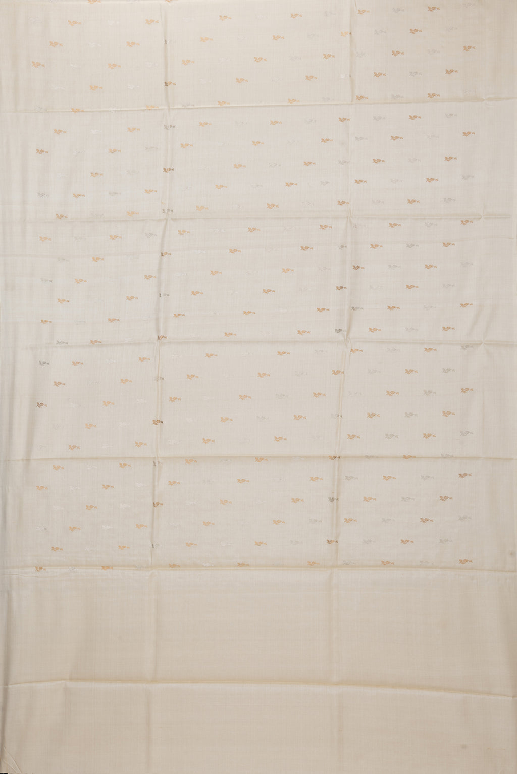 Flat view of Off White Dual Tone Tussar Silk Saree with Zari Butta on the body and Without Border. 