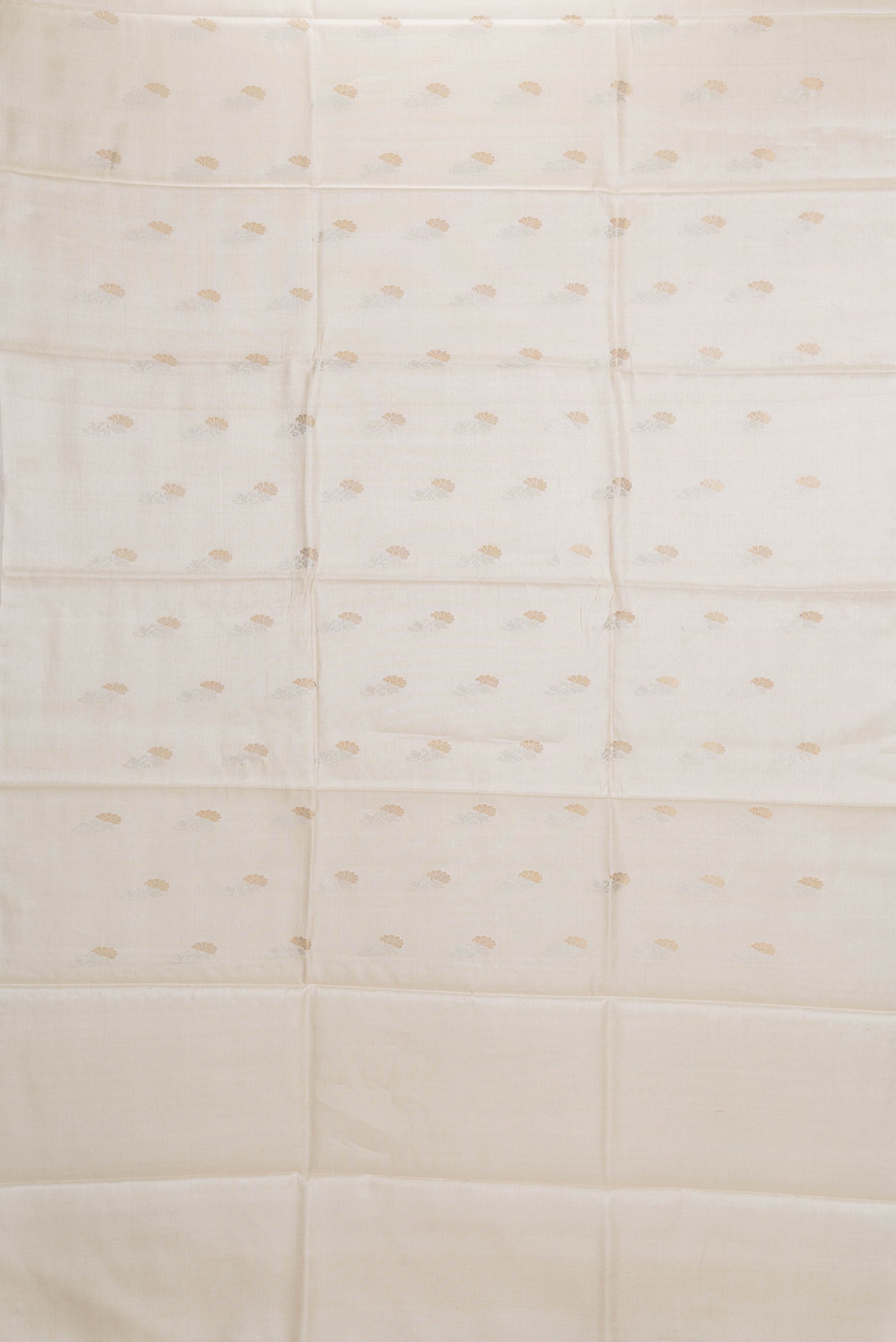 Flat view of Beige Dual Tone Tussar Silk Saree with Zari Butta on the body and Without Border. 