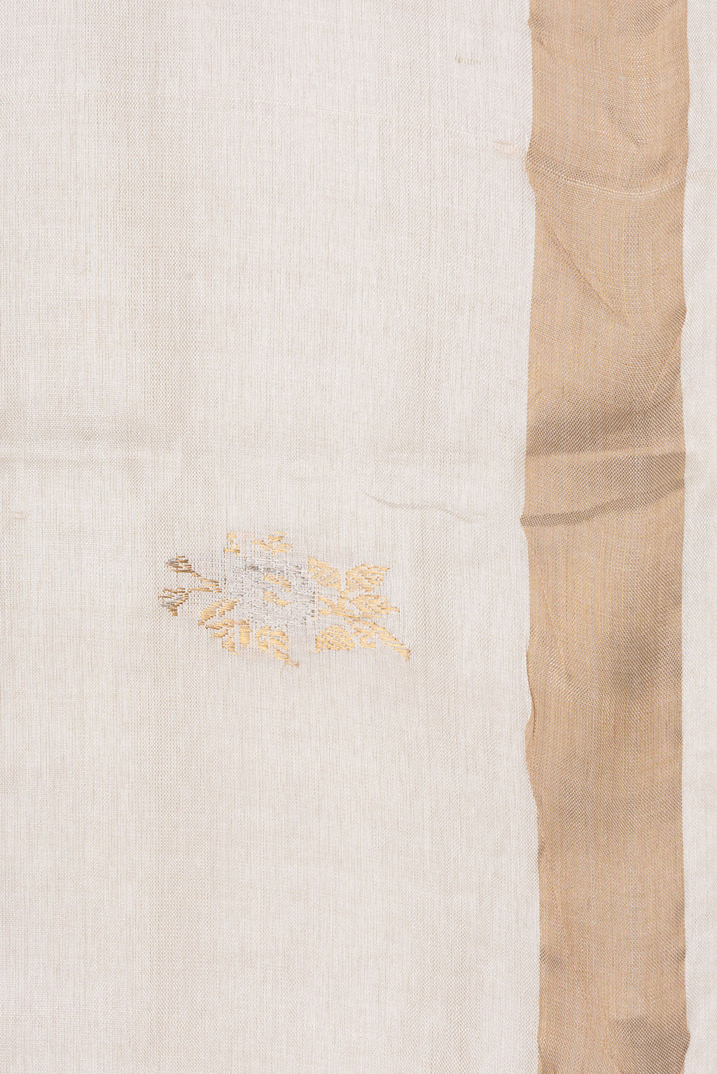 Border image of Beige Dual Tone Tussar Silk Saree with Zari Butta on the body and Zari Border. 