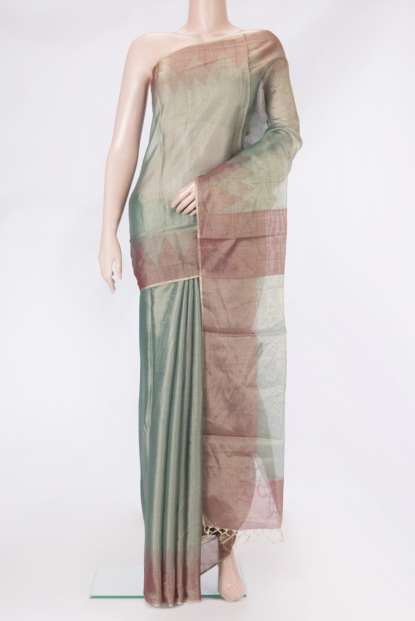 Green Tussar Silk Saree with Plain Body and Temple Border.  displayed on a mannequin