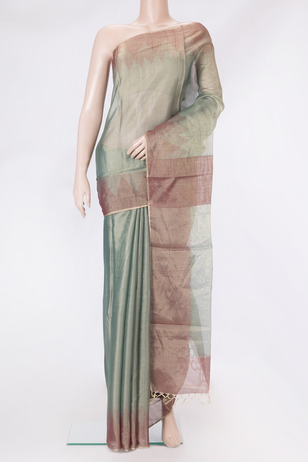Green Tussar Silk Saree with Plain Body and Temple Border.  displayed on a mannequin