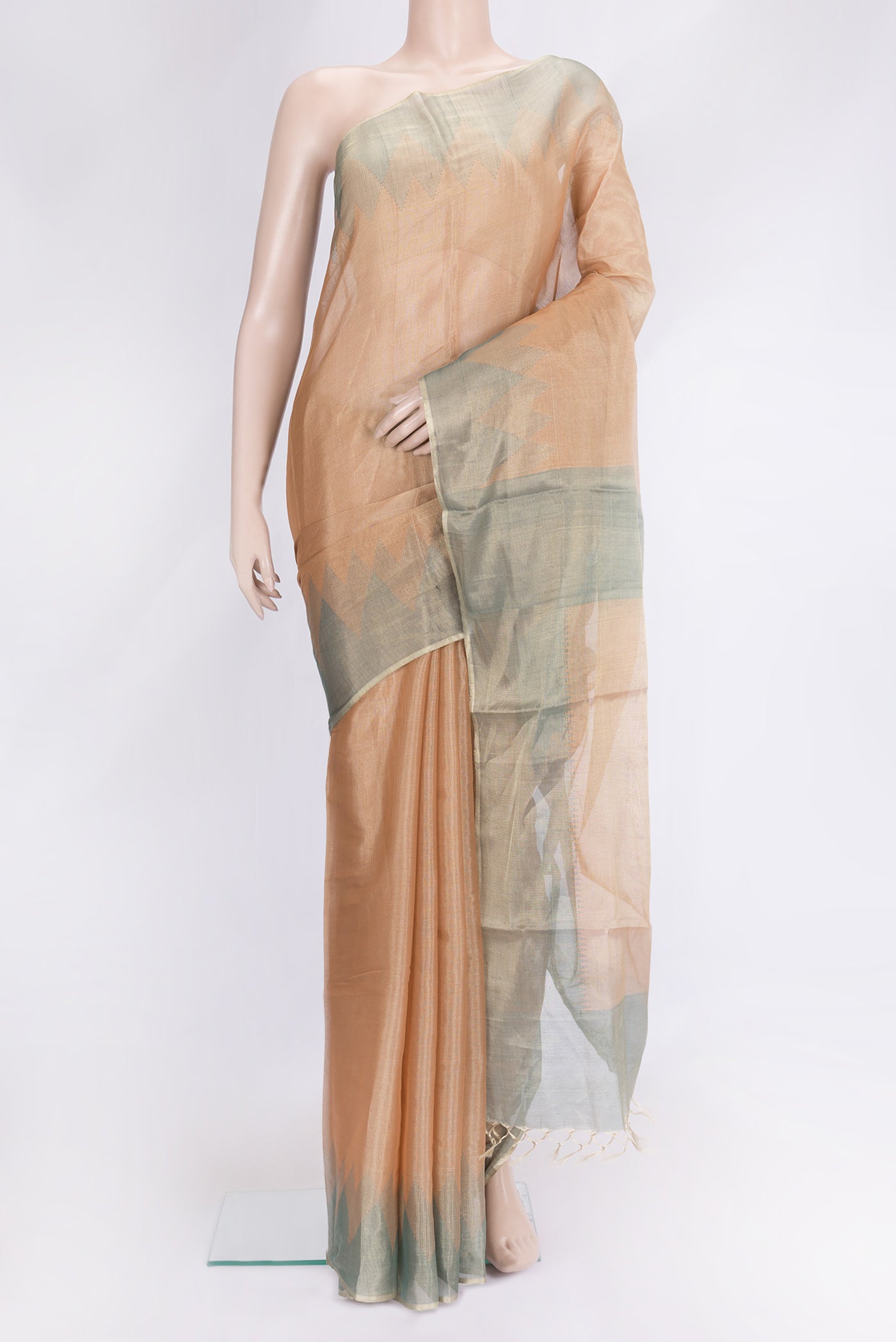 Gold Dual Tone Tussar Silk Saree with Plain Body and Printed Border.  displayed on a mannequin