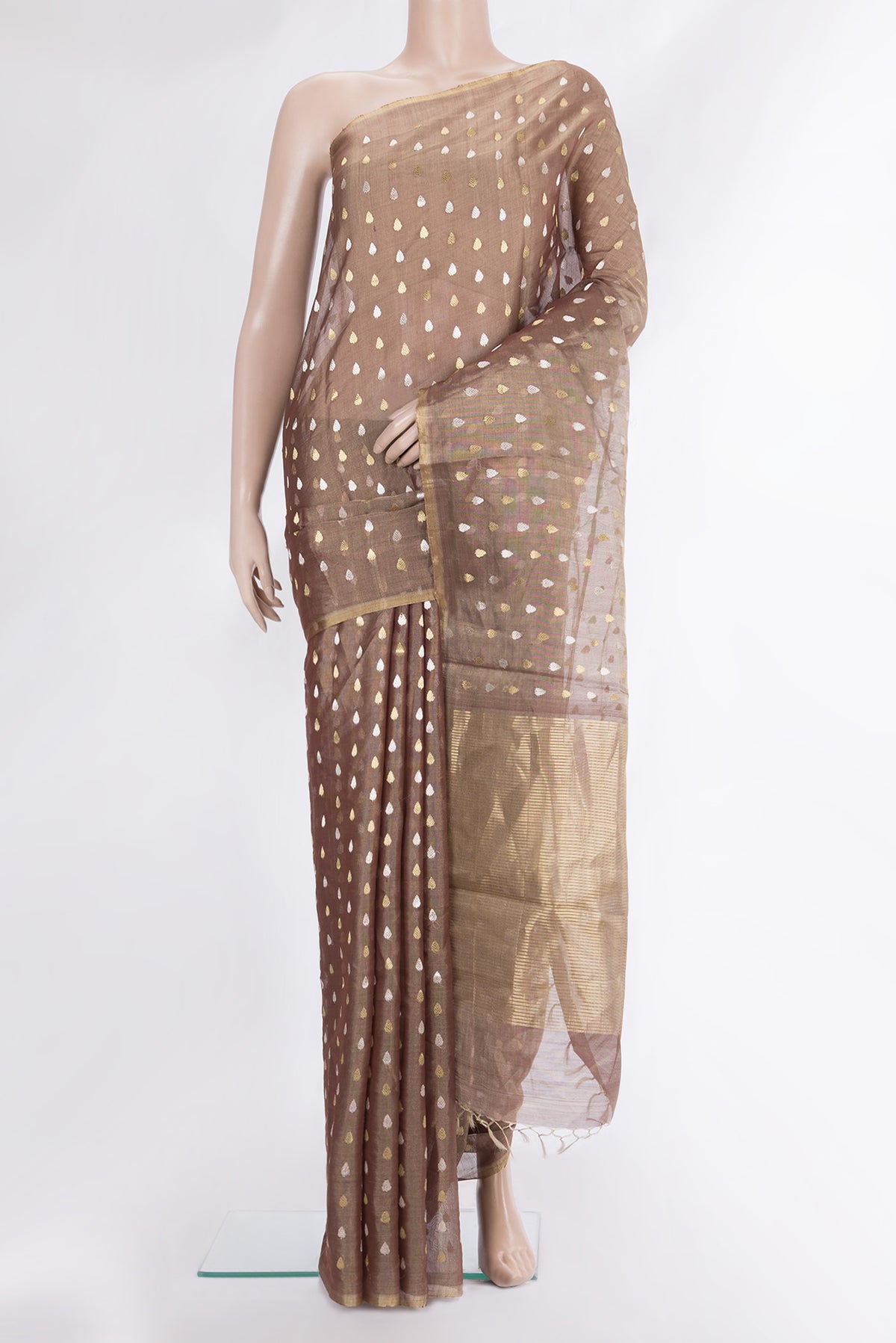 Brown Dual Tone Tussar Saree with Zari Butta on the body and Zari Border.  displayed on a mannequin