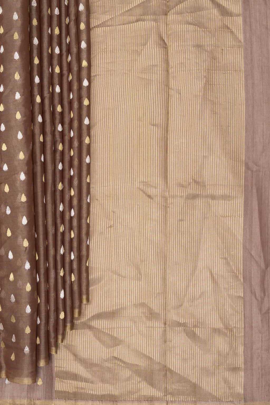 Pleats and pallu of Brown Dual Tone Tussar Saree with Zari Butta on the body and Zari Border. 