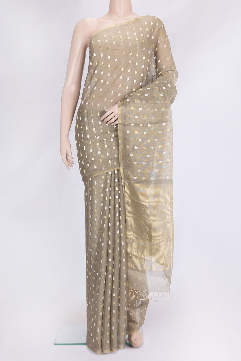 Mehandi Green Dual Tone Tussar Silk Saree with Zari Butta on the body and Thin Zari Line.  displayed on a mannequin