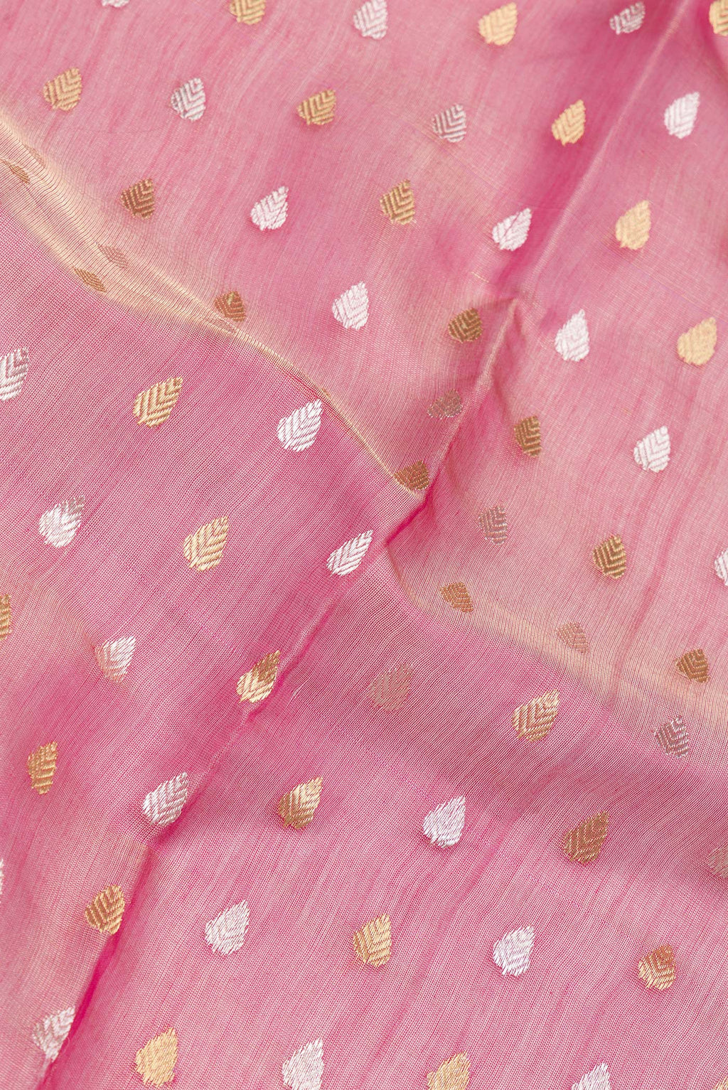 Close up of Rose pink Dual Tone Tussar Silk Saree with Zari Butta on the body and Zari Border.  displaying folds
