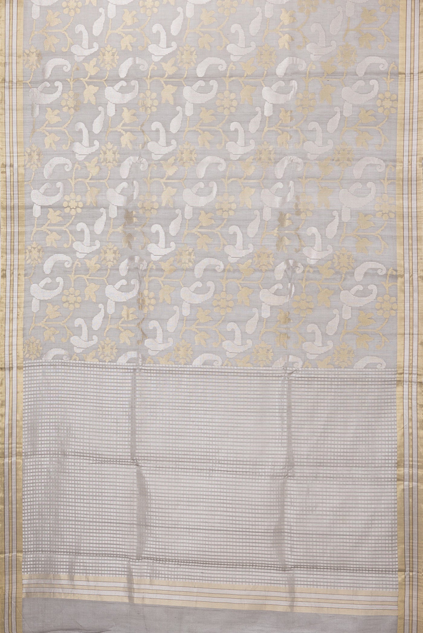 Flat view of Grey Tussar Silk Saree with Zari Brocade on the body and Zari Border. 
