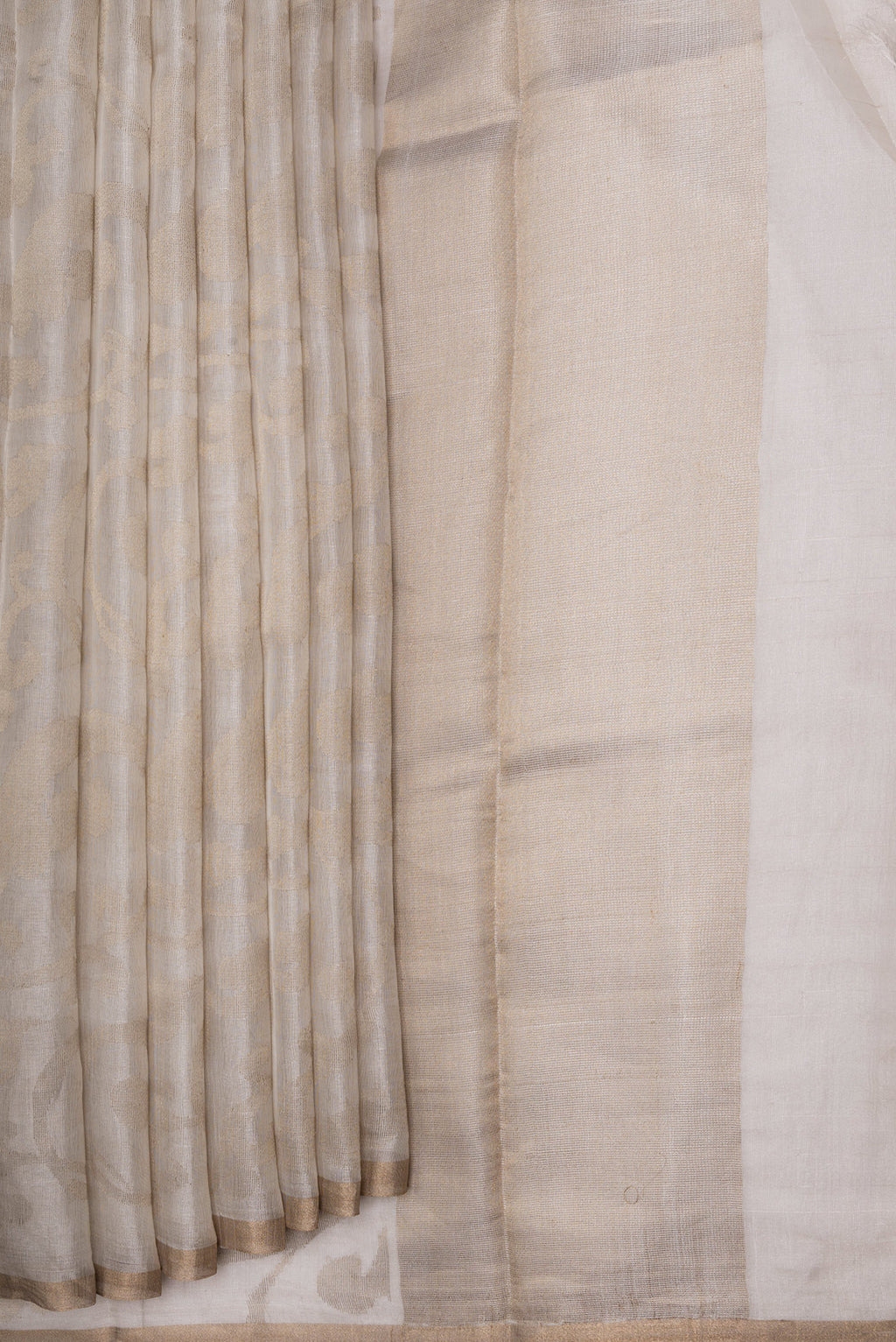 Pleats and pallu of Beige Dual Tone Chanderi Silk Saree with Zari Brocade on the body and Zari Border. 