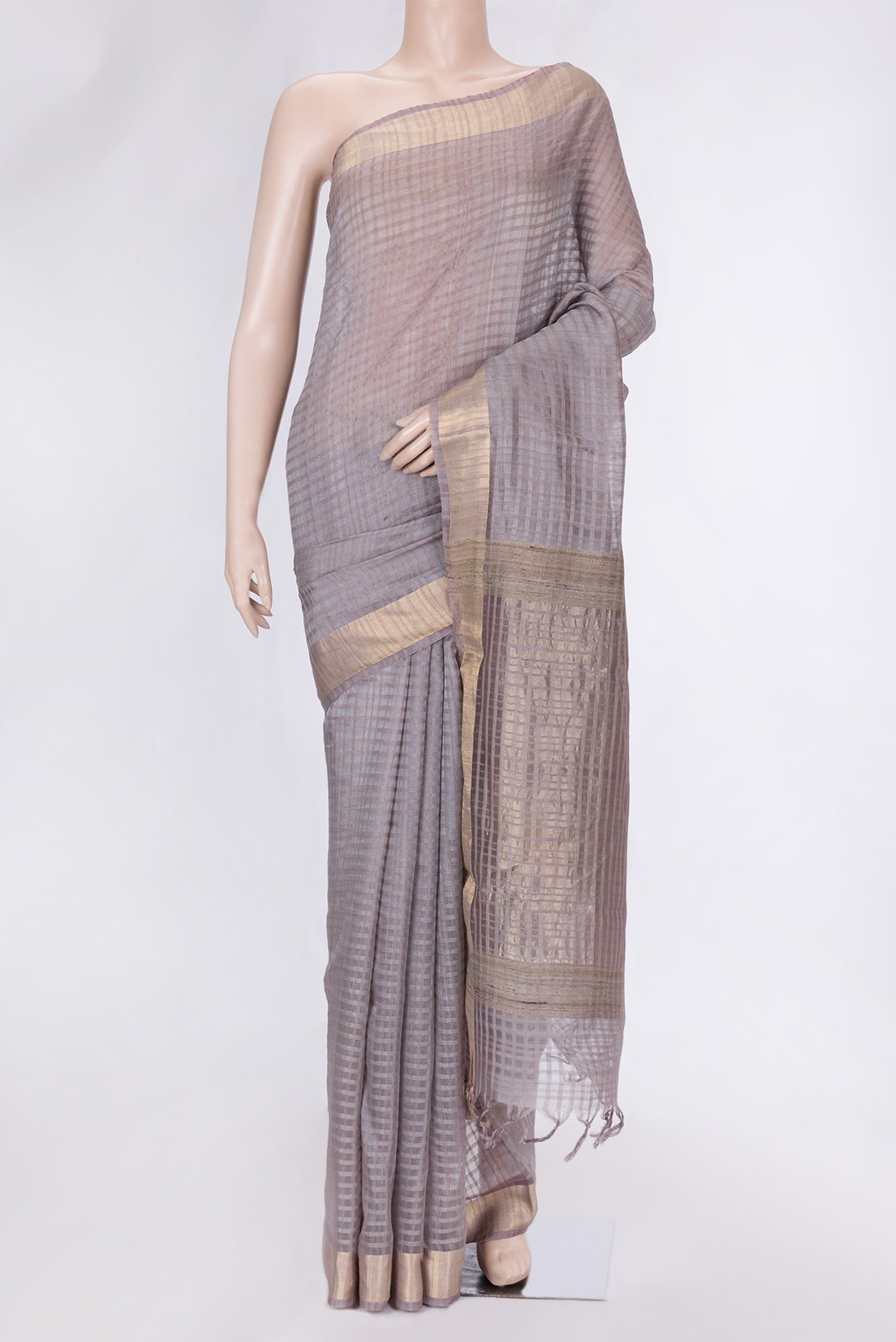 Grey Dual Tone Tussar Silk Saree with Checked design on the body and Zari Border.  displayed on a mannequin