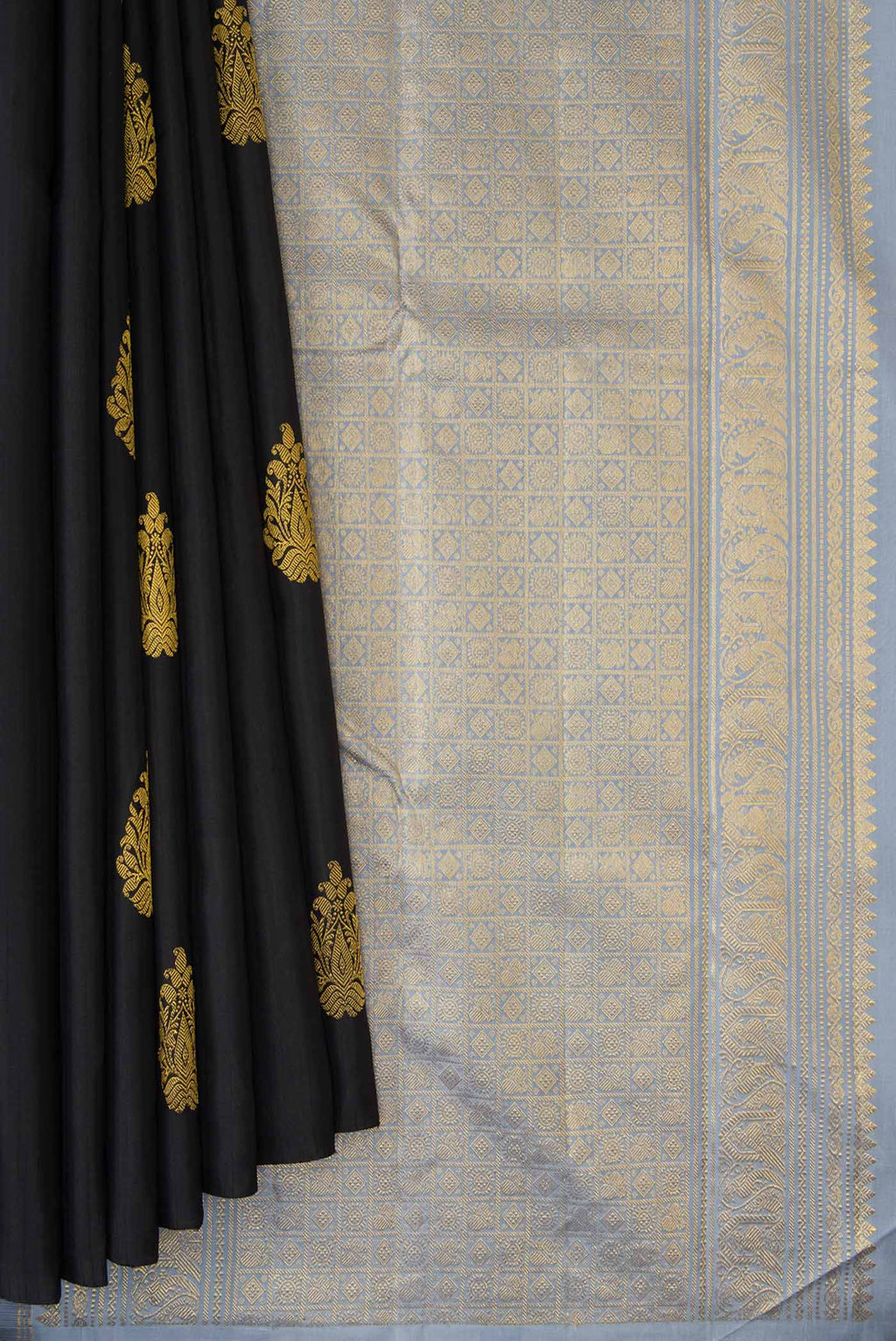 Pleats and pallu of Black Dual Tone Kanchipuram Silk Saree with Zari Butta on the body and Without Border