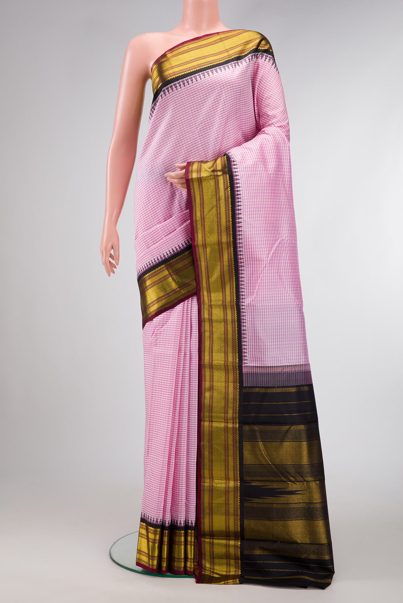 Pink Dual Tone Kanjivaram Silk Saree with Checked design on the body and Zari Border.  displayed on a mannequin