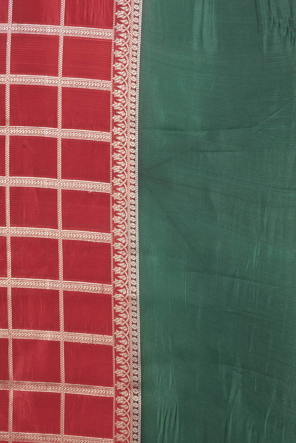 Border image of Maroon Dual Tone Tussar Silk Saree with Checked design on the body and Zari Border. 