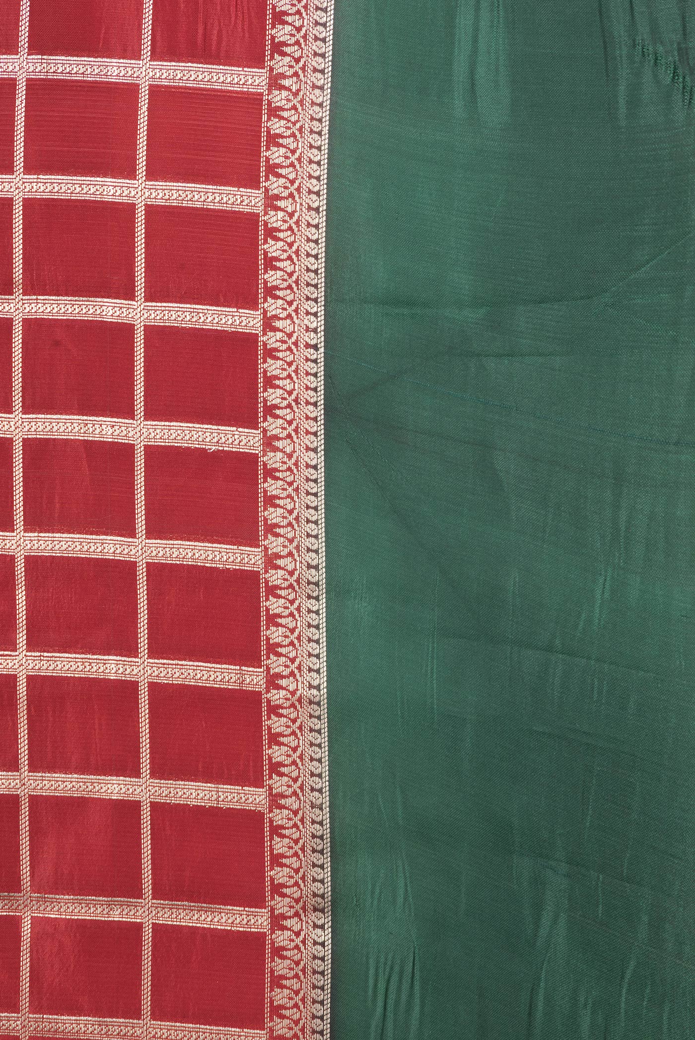 Border image of Maroon Dual Tone Tussar Silk Saree with Checked design on the body and Zari Border. 