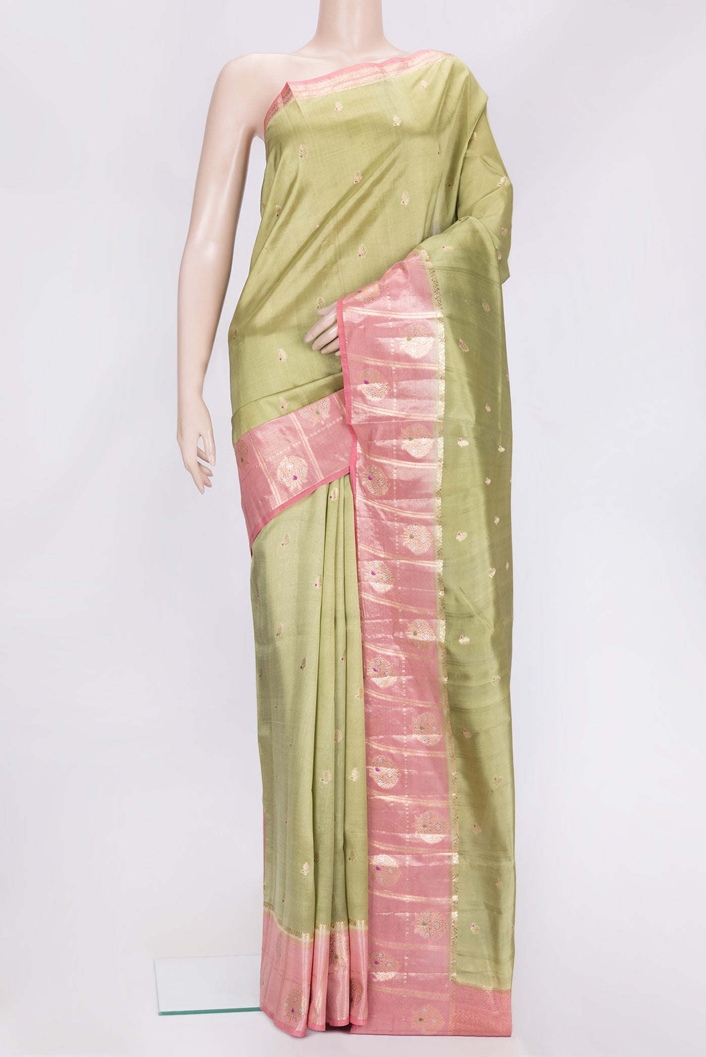 Mehandi Green Dual Tone Tussar Silk Saree with Zari Butta on the body and Fancy Border.  displayed on a mannequin