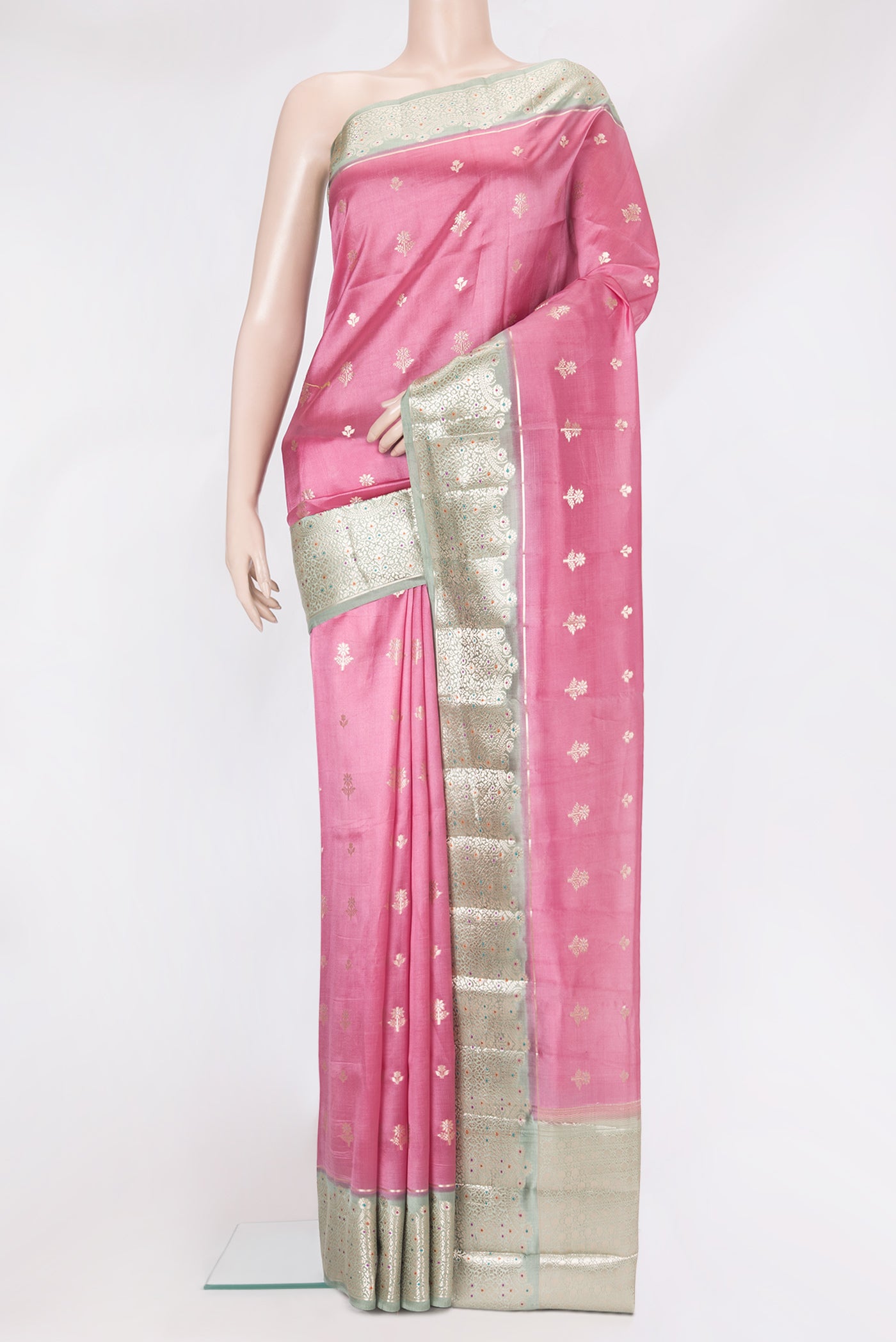 Pink Dual Tone Tussar Silk Saree with Zari Butta on the body and Fancy Border.  displayed on a mannequin