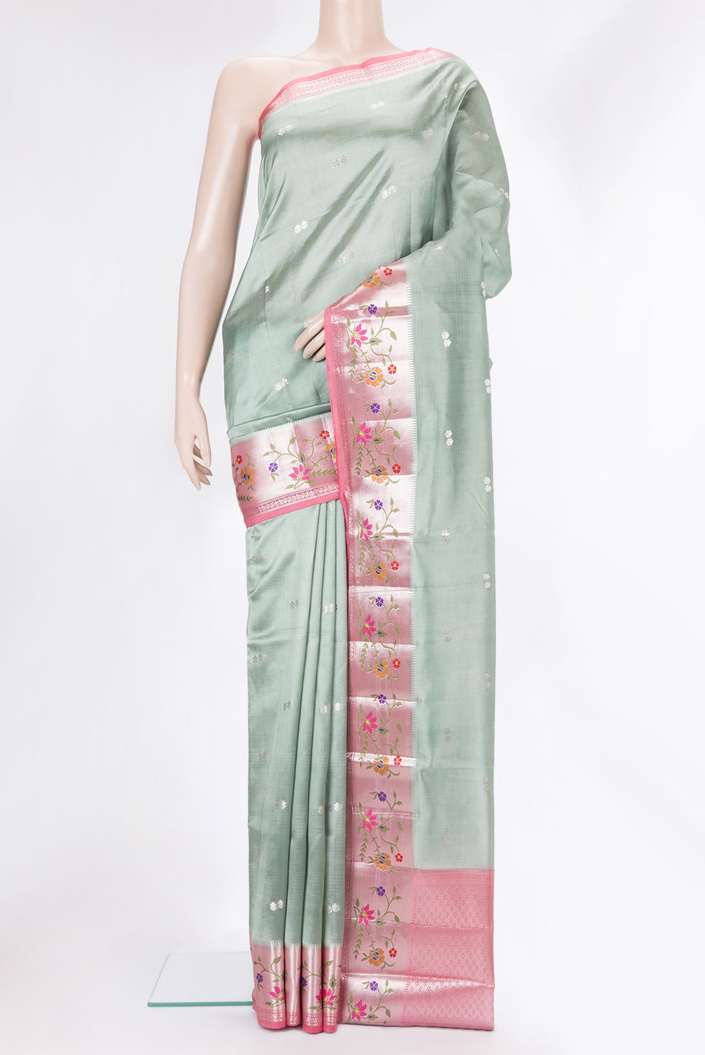 Pure Silk Light Green Dual Tone Tussar Saree with Zari Butta on the body and Fancy Border.  displayed on a mannequin