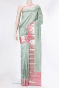 Pure Silk Light Green Dual Tone Tussar Saree with Zari Butta on the body and Fancy Border.  displayed on a mannequin