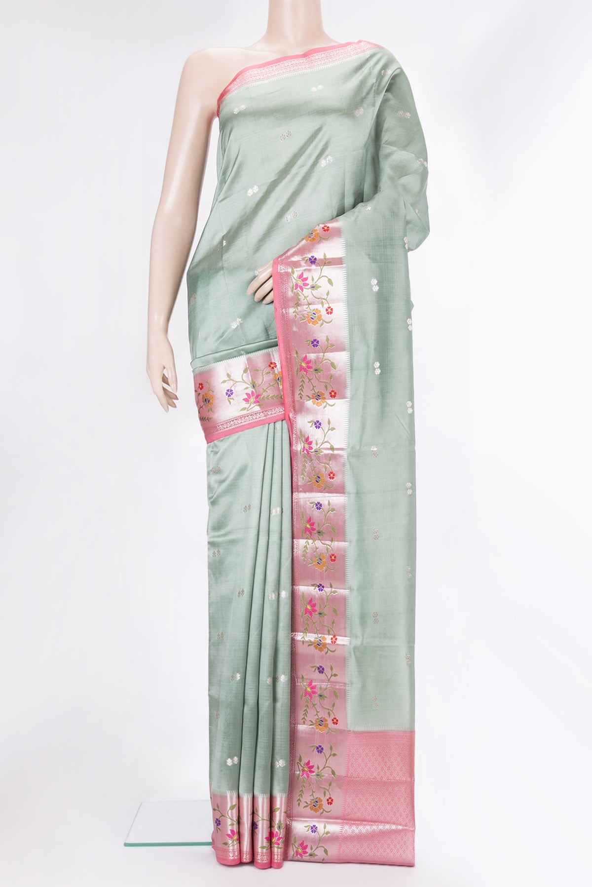 Pure Silk Light Green Dual Tone Tussar Saree with Zari Butta on the body and Fancy Border.  displayed on a mannequin
